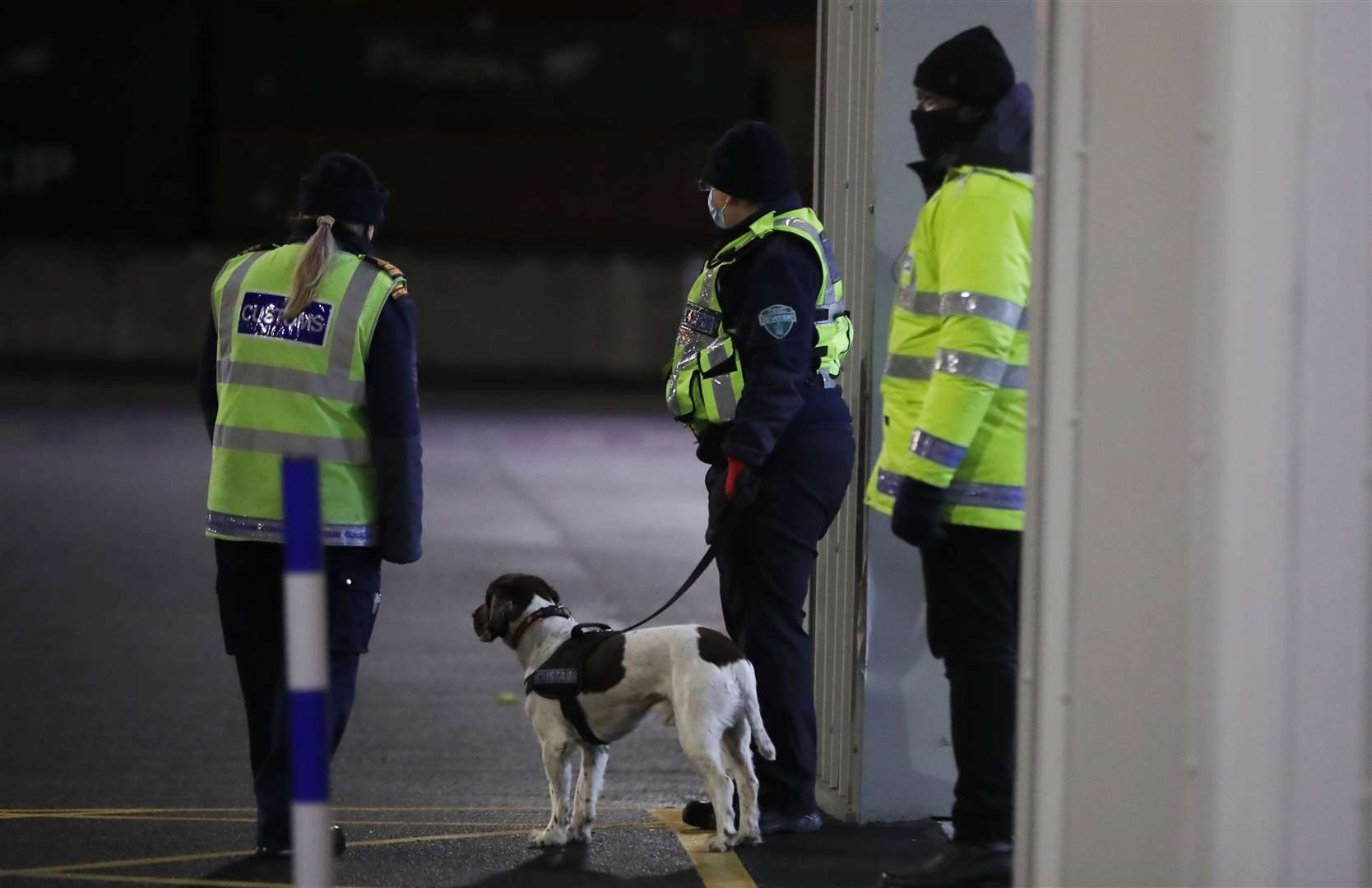 Customs officers wait for trucks at a newly built post at Dublin Port (Niall Carson/PA)