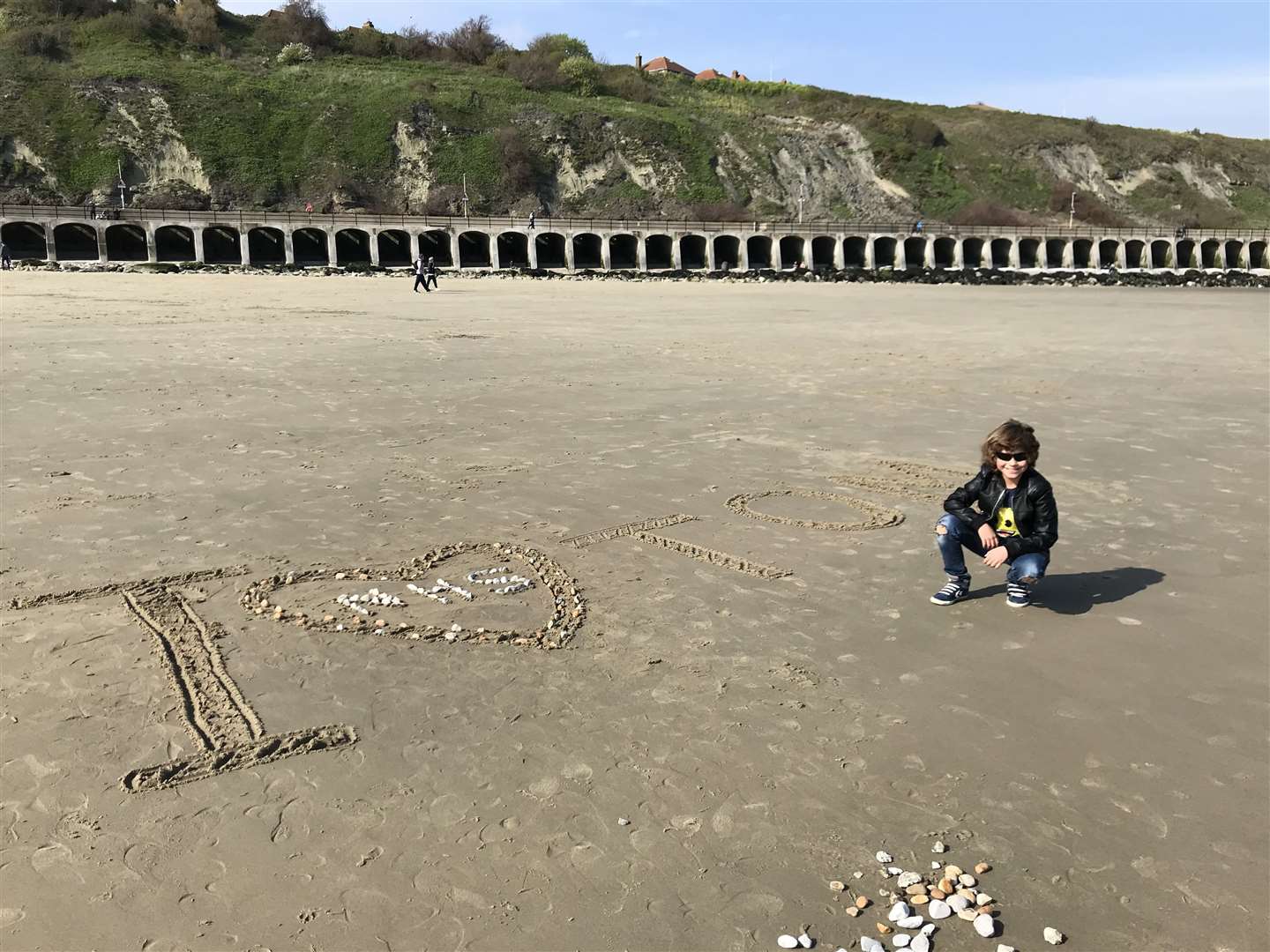 Part of Andrei's birthday message was written in the sand