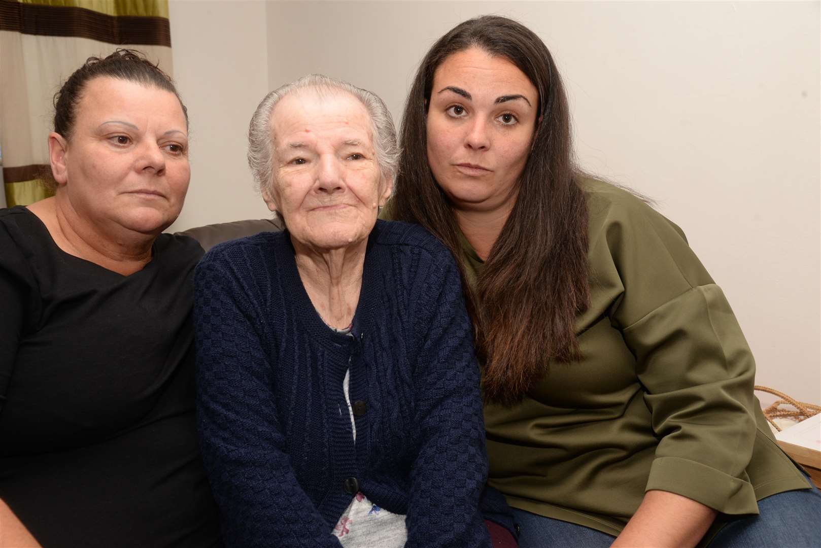 Beryl Harris, 87 of Leysdown, with daughter and granddaughter Tina and Gemma Cunningham, was locked on an Age UK bus for three hours. Picture: Chris Davey