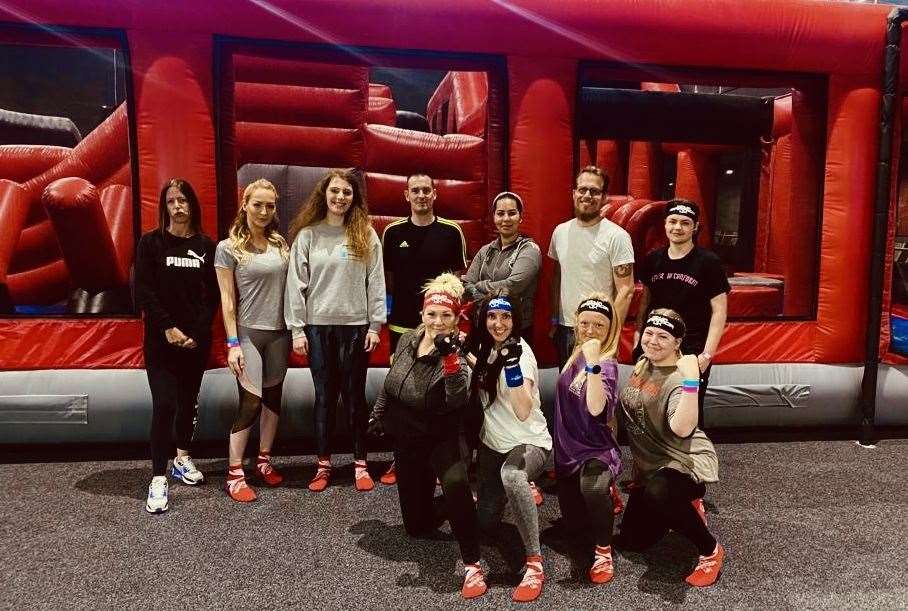 Emily with her work colleagues at Ninja Warrior. Picture: Emily Hale