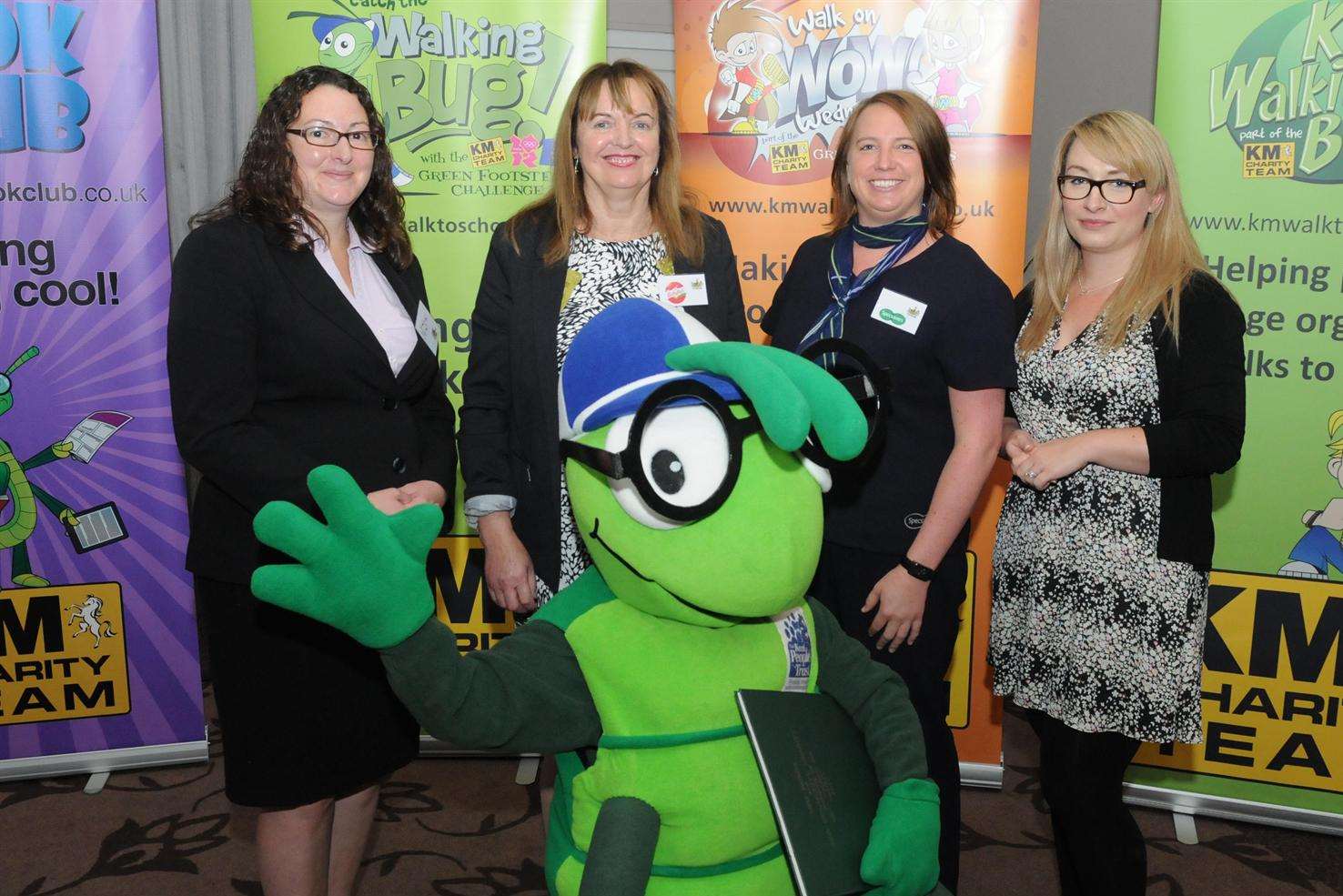 Formal launch of Buster's Book Club at the KM Charity Team's annual forum at Mercure Great Danes Hotel, Maidstone, with sponsors Nicki Curry (Three R's Teacher Recruitment), Elizabeth Carr (Mini Babybel), Ruth Warren (Specsavers) and Sarah Butler (Orbit South)