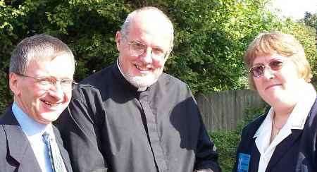 The Rev Colin Johnson, centre, with church wardens Christopher Gabriel and Christine Ford