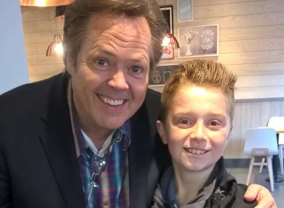 Daniel with Jimmy Osmond who bought him a KFC in Chatham High Street