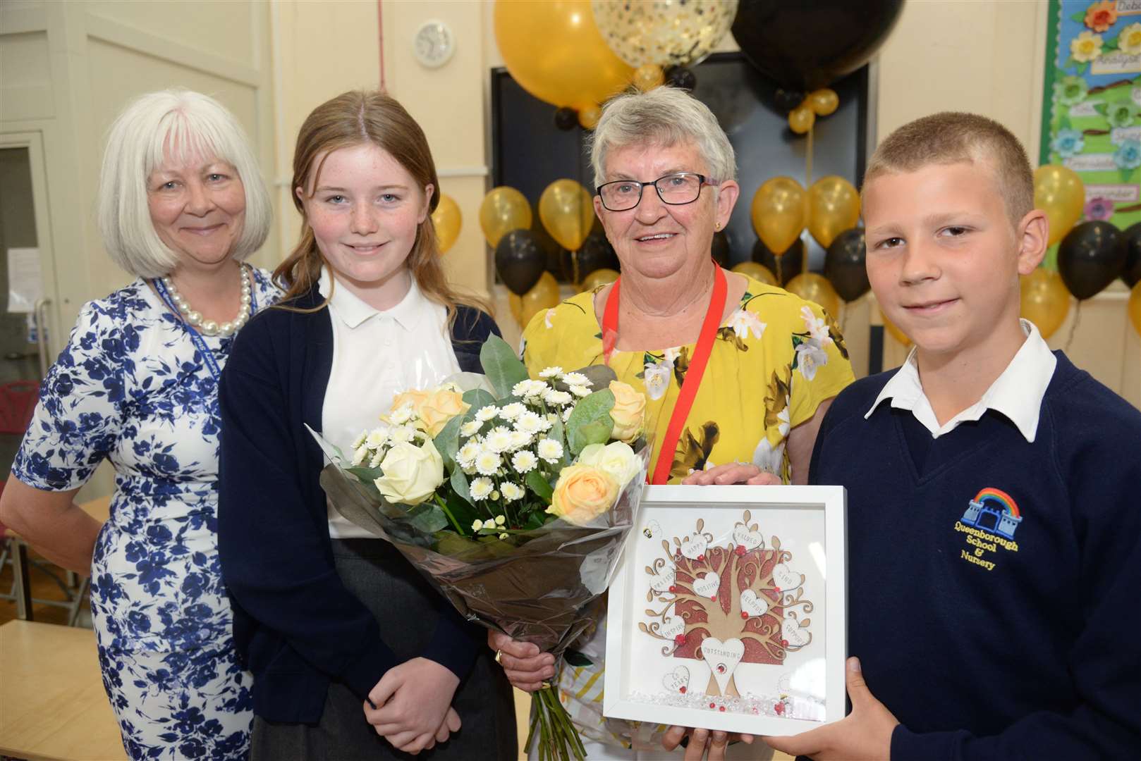 Head teacher Barbara Conroy, with head girl and boy Hope Duggan and Louis Strauss and dinner lady Rita Curtis. Picture: Chris Davey