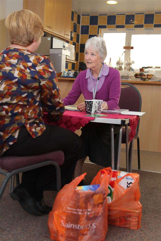 Medway Foodbank volunteer Wendy with a client