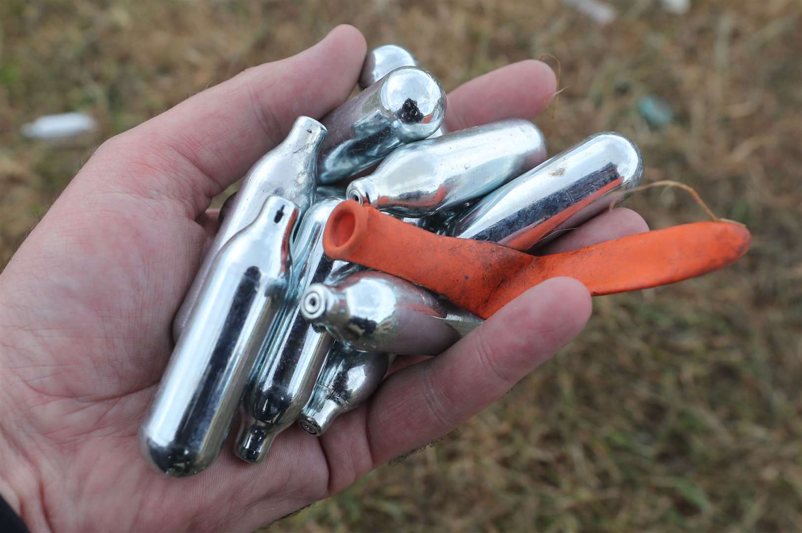 Mr Sunak criticised people who discarded nitrous oxide canisters in playgrounds (Niall Carson/PA)