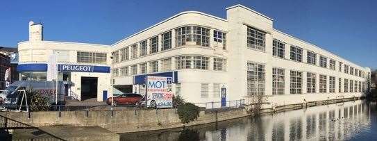 Plans have been submitted to turn Len House, a former Peugeot dealership, into housing, with some commercial use as well