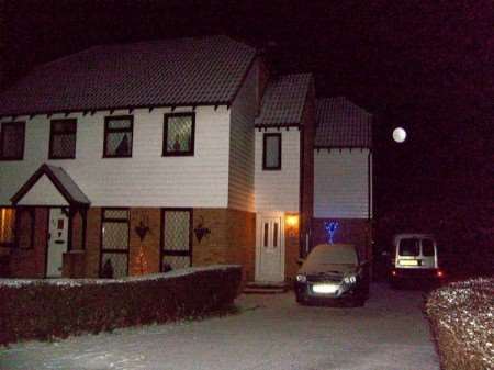 The mystery object - not the moon - spotted behind the family's house