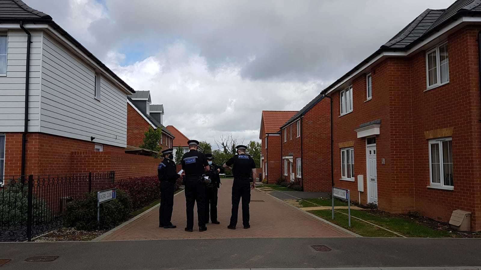 Police officers have been knocking on doors in the area