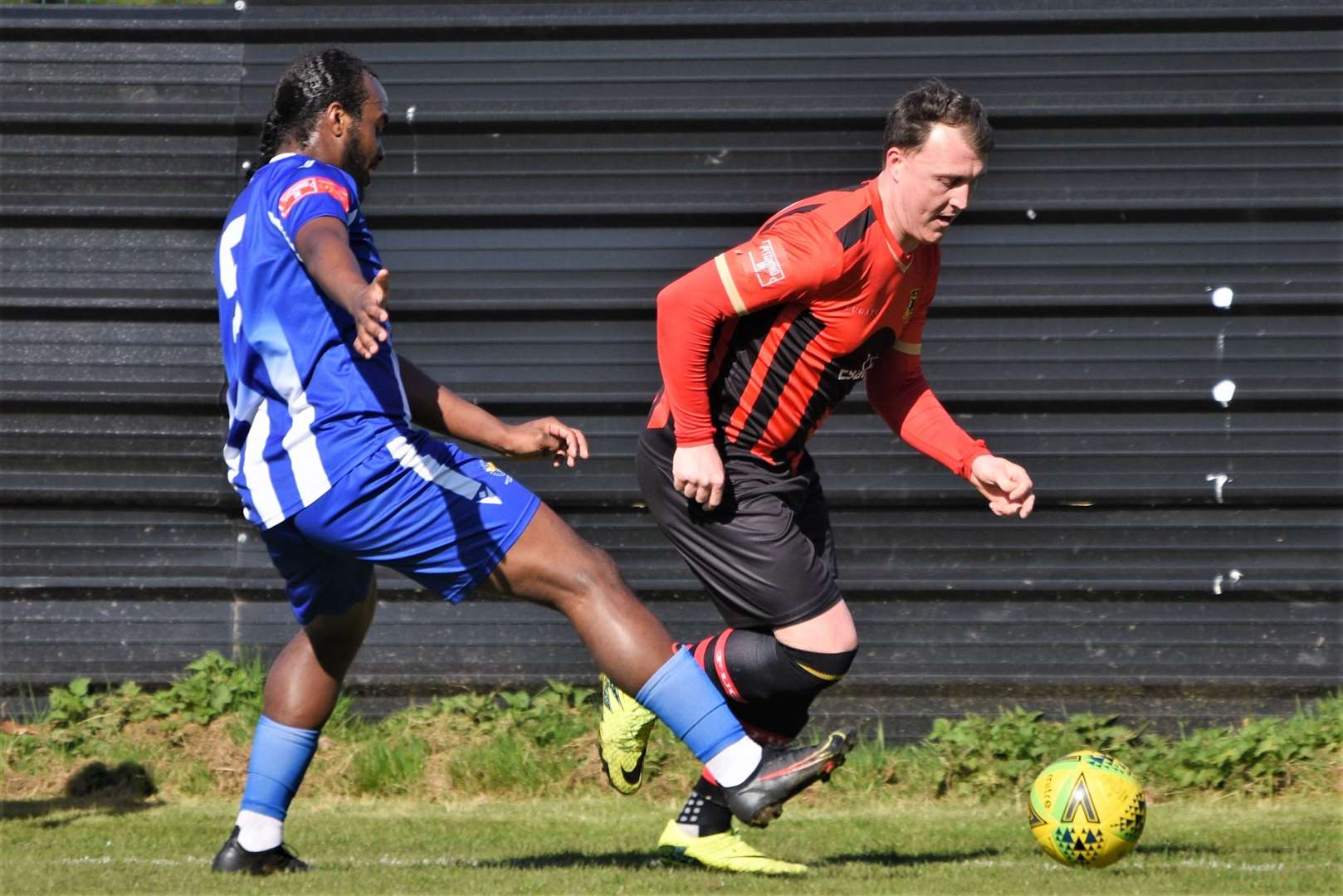 Alex Flisher gets down the flank during the Brickies' draw with East Grinstead Picture: Ken Medwyn