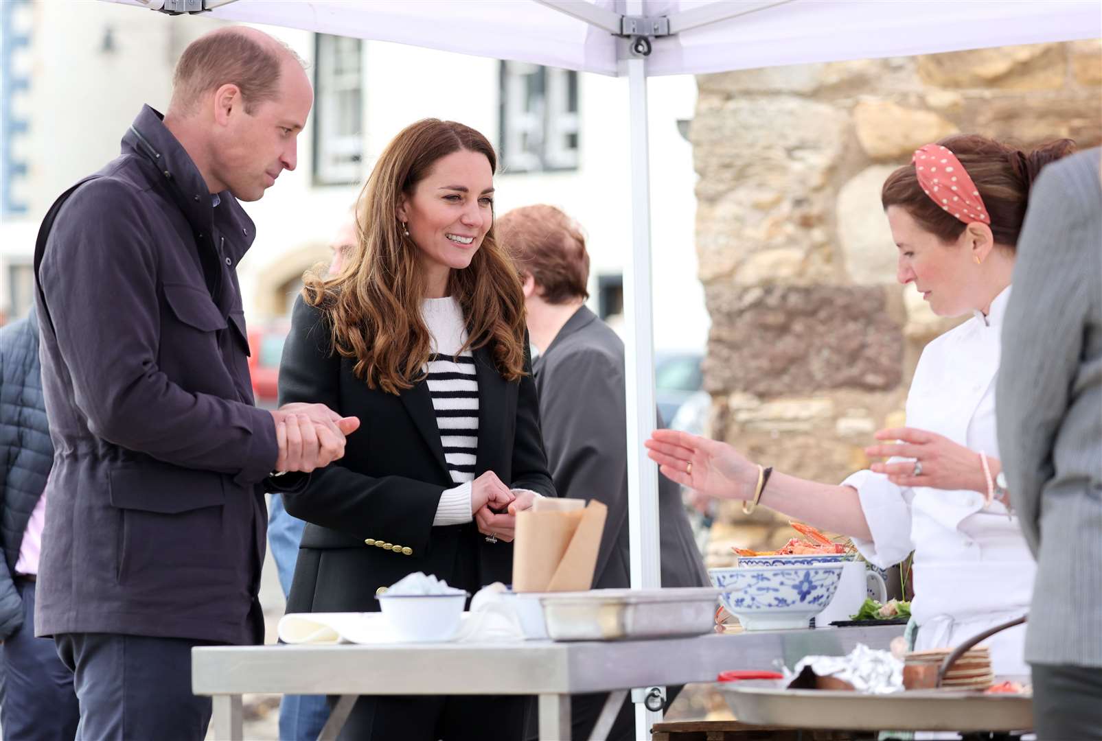 The Duke and Duchess of Cambridge look at local produce during a meeting with fishermen and their families in Fife (Chris Jackson/PA)