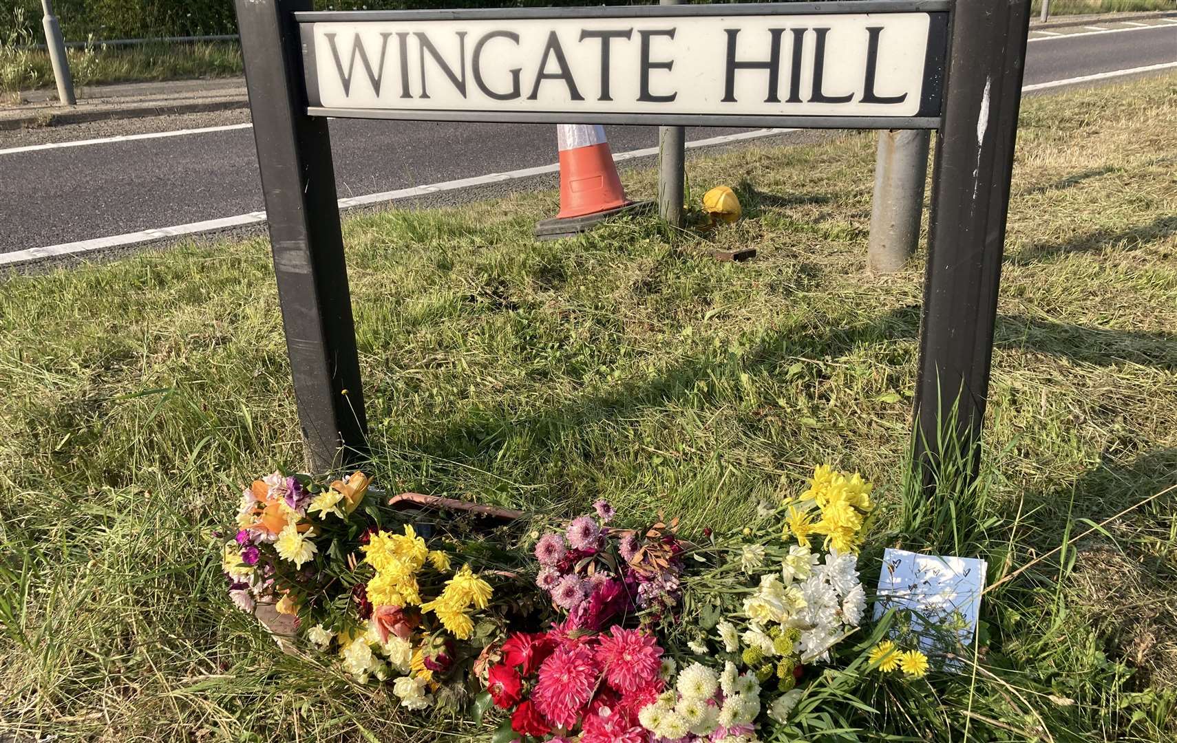 Floral tributes to Ed Glover close to the scene of the crash in Wingate Hill, Canterbury
