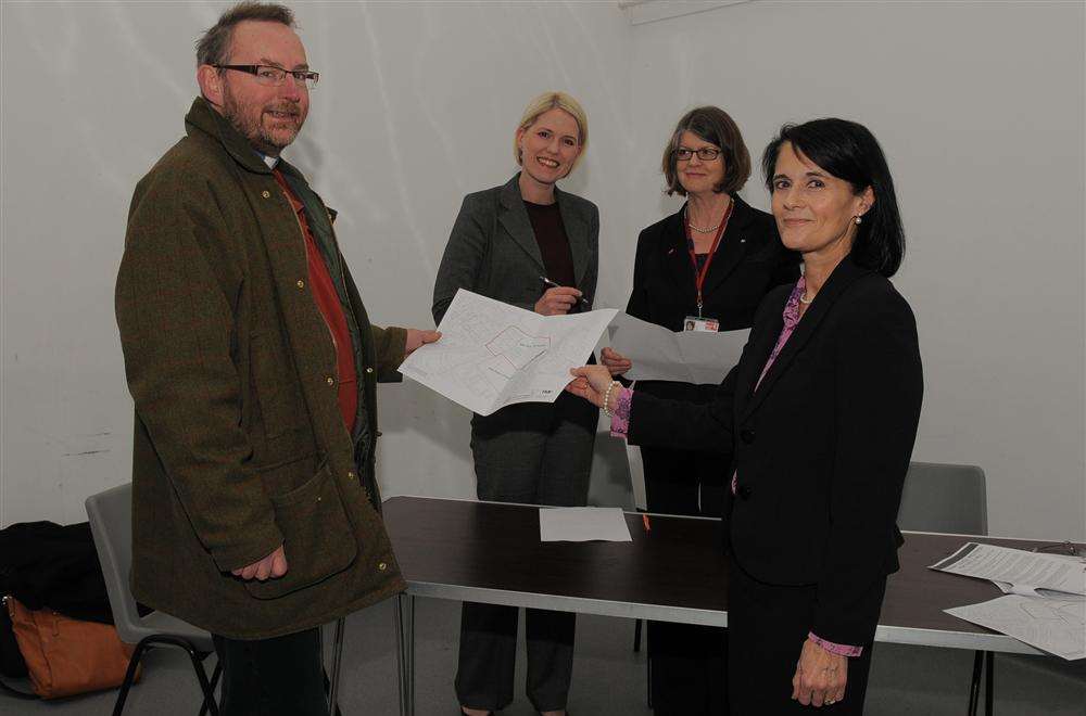 Rev Tim Hall looks at plans with Marisa White, Kate Stansfield and Jane Wiles at the Thistle Hill Community Centre