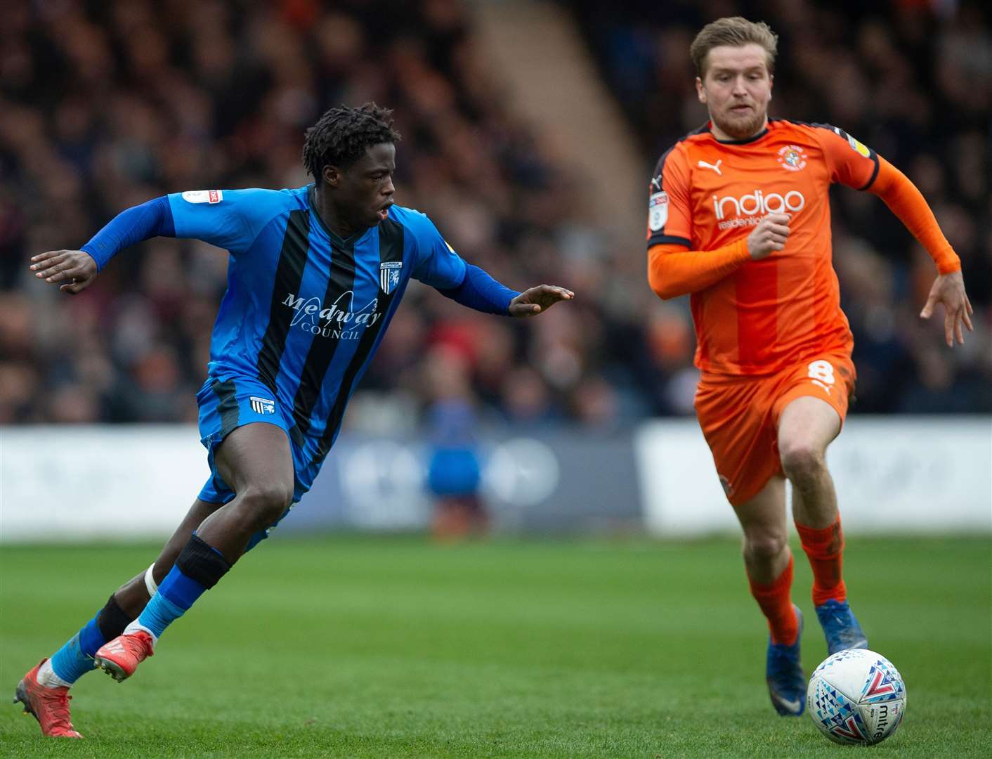 Gillingham's Leo Da Silva Lopes gets to the ball before Luton's Luke Berry Picture: Ady Kerry