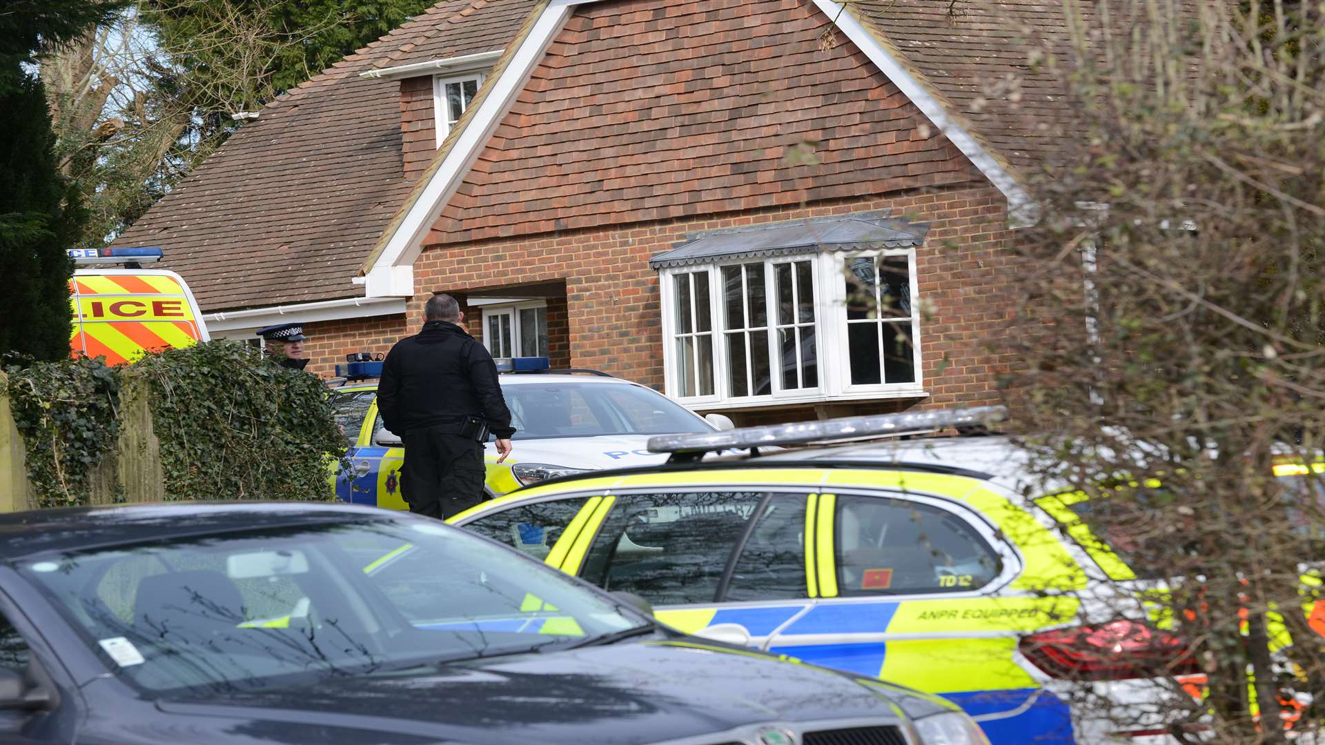 Police at the scene in Golford where two men were arrested in March.