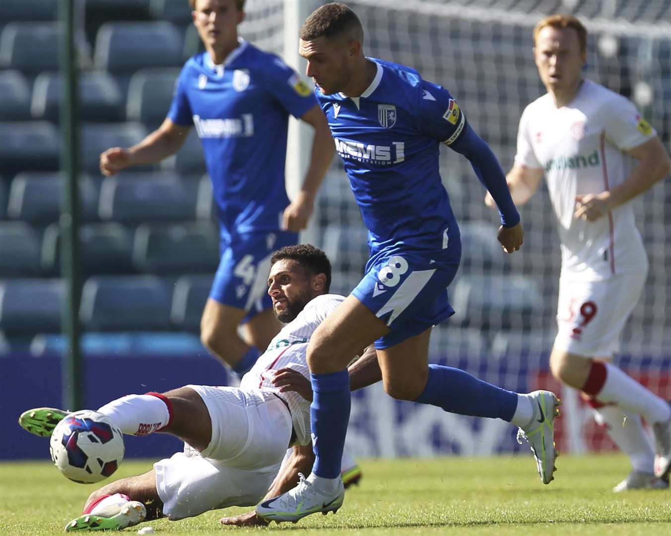 Gillingham skipper Stuart O'Keefe battles for the ball in the goalless draw on Saturday with Walsall. Picture: KPI