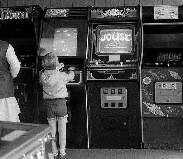 This child tries their best to reach the controls. Copyright: George Wilson