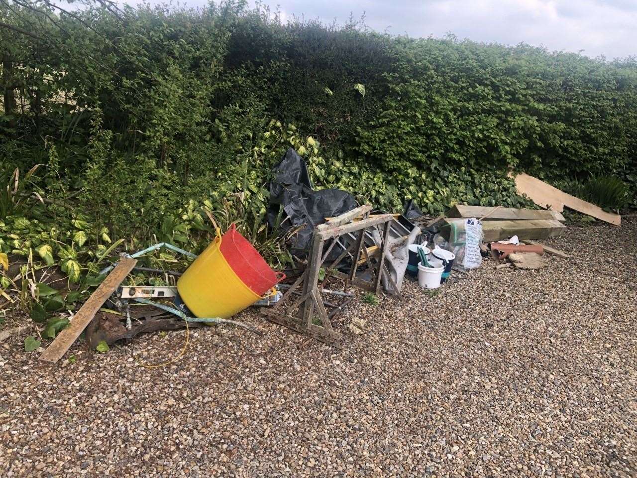 Builder's items left behind in the garden of Sandra and Stephen West's home in Benenden, near Tunbridge Wells. Picture: SWNS