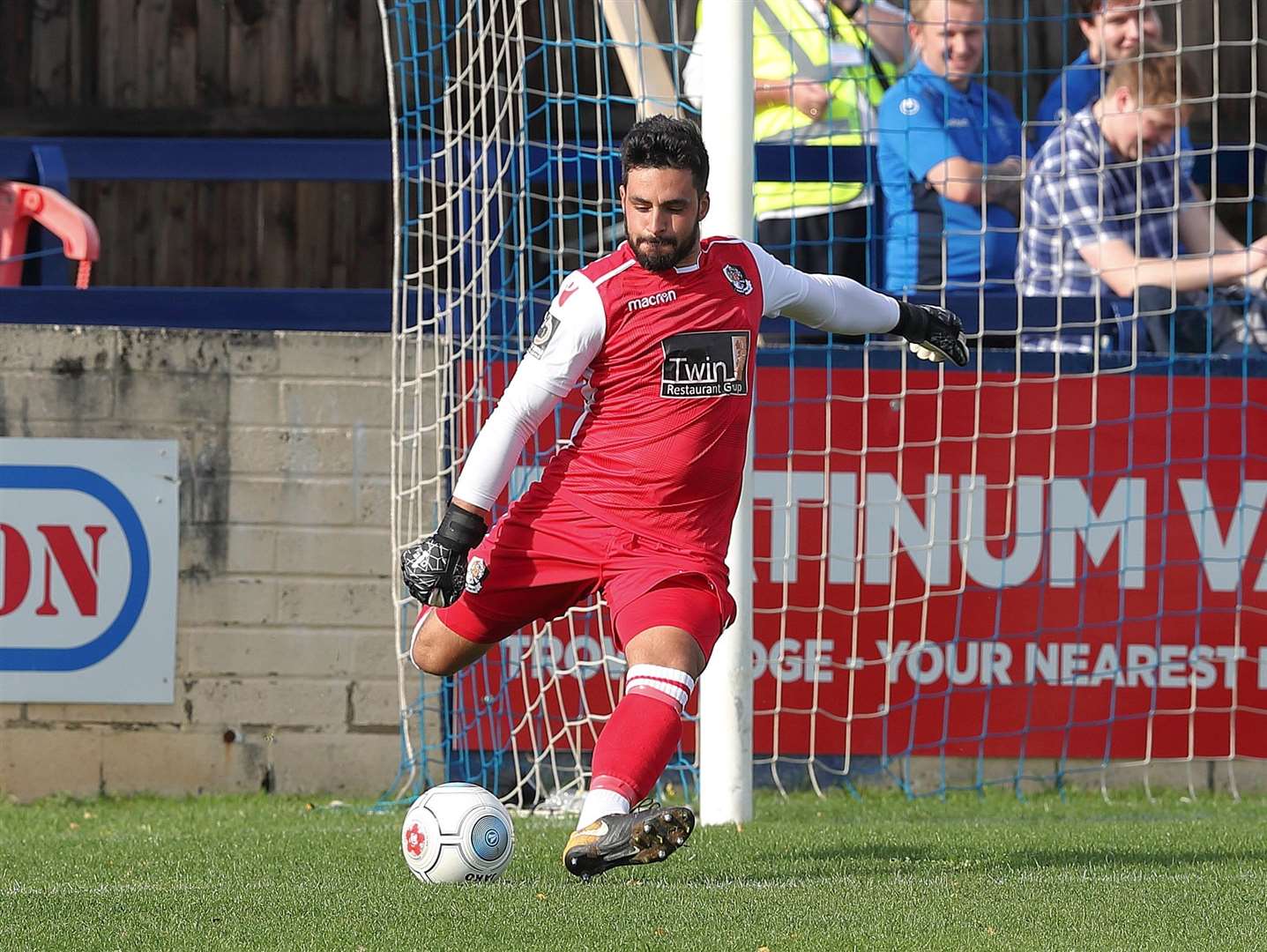 Deren Ibrahim launches the ball forward at Chippenham Picture: Richard Chappell