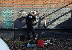 The vandal spent an afternoon removing graffiti tags. Picture: Kent Police (15546223)