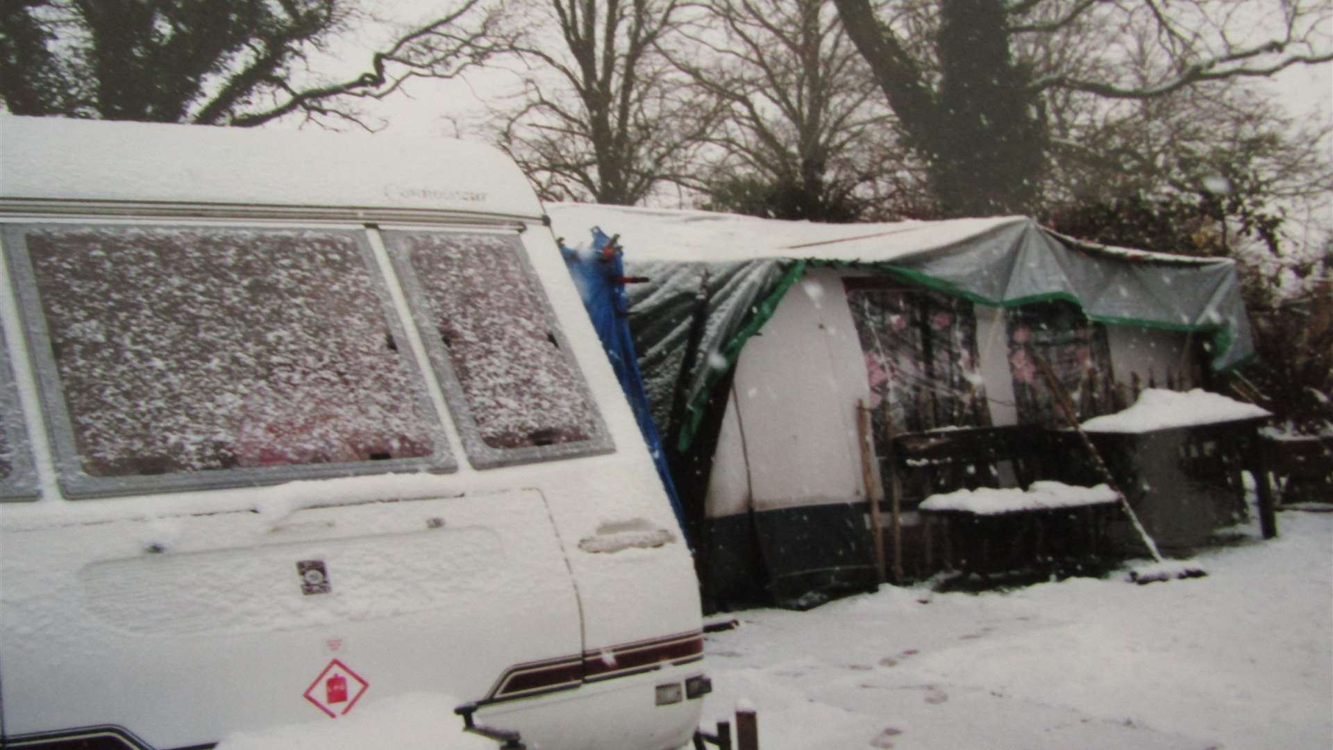 The family endured a bitter winter holed up in their caravan while their home was being built