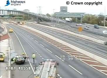 Firefighters at the scene. Pic: Highways England