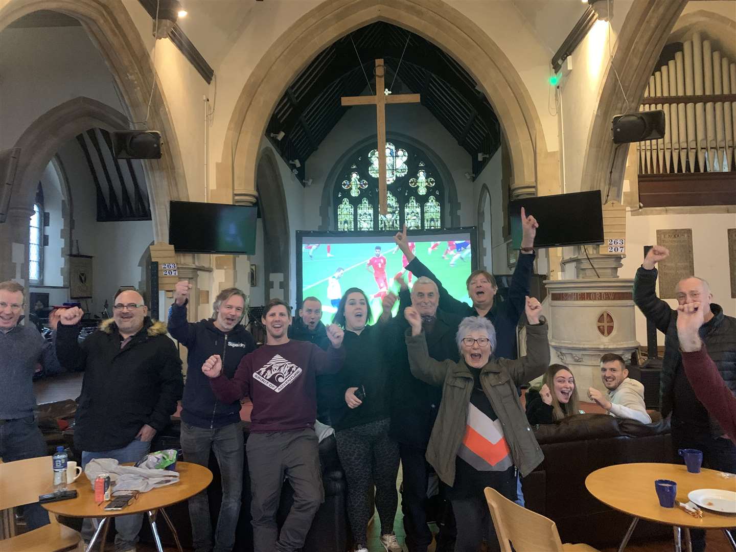 More than 25 people gathered to watch England's opening draw in the church