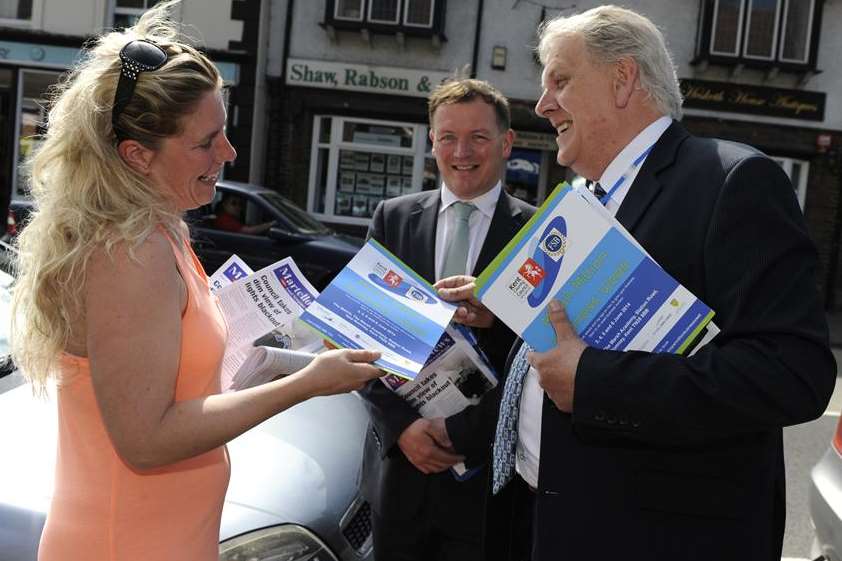 Bill Fox of the Federation of Small Businesses hands out a leaflet