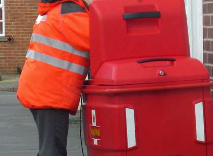 A postie on their rounds. Sock image
