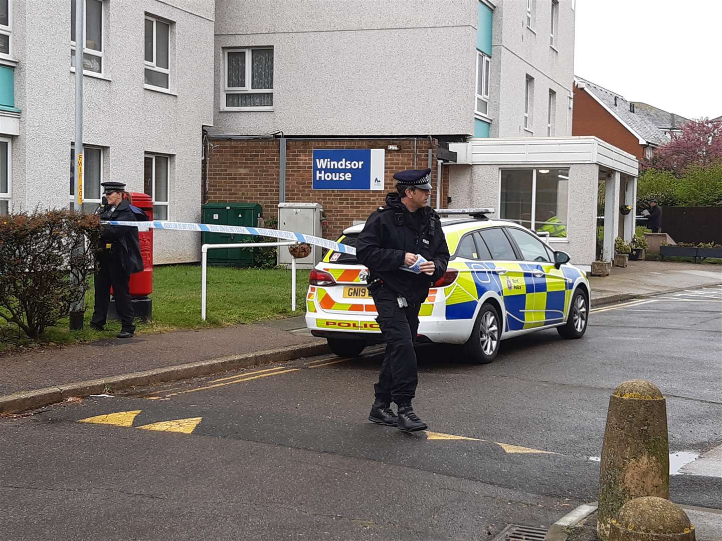 Police have taped off an area outside the tower block