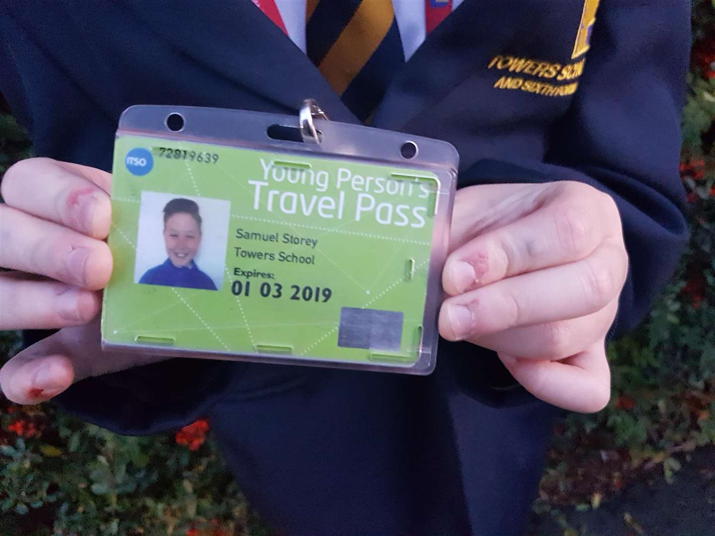 The bus pass in its holder
