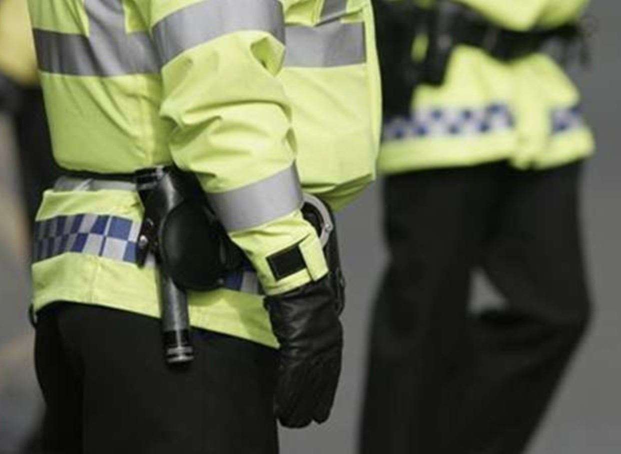 Two officers were assaulted in a nearby car park last month