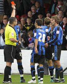 Mark Bentley is shown a red card