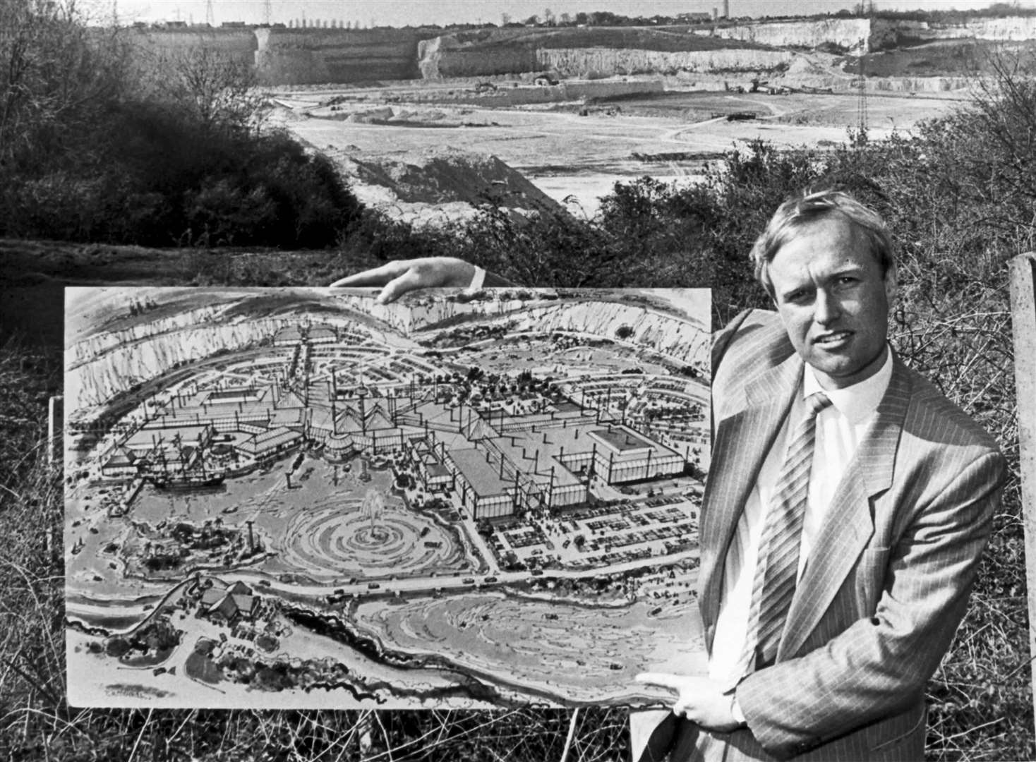 Tim Hook, project manager of Blue Water Park, with plans for the superc entre in the quarry site. Pictured here in April 1988.