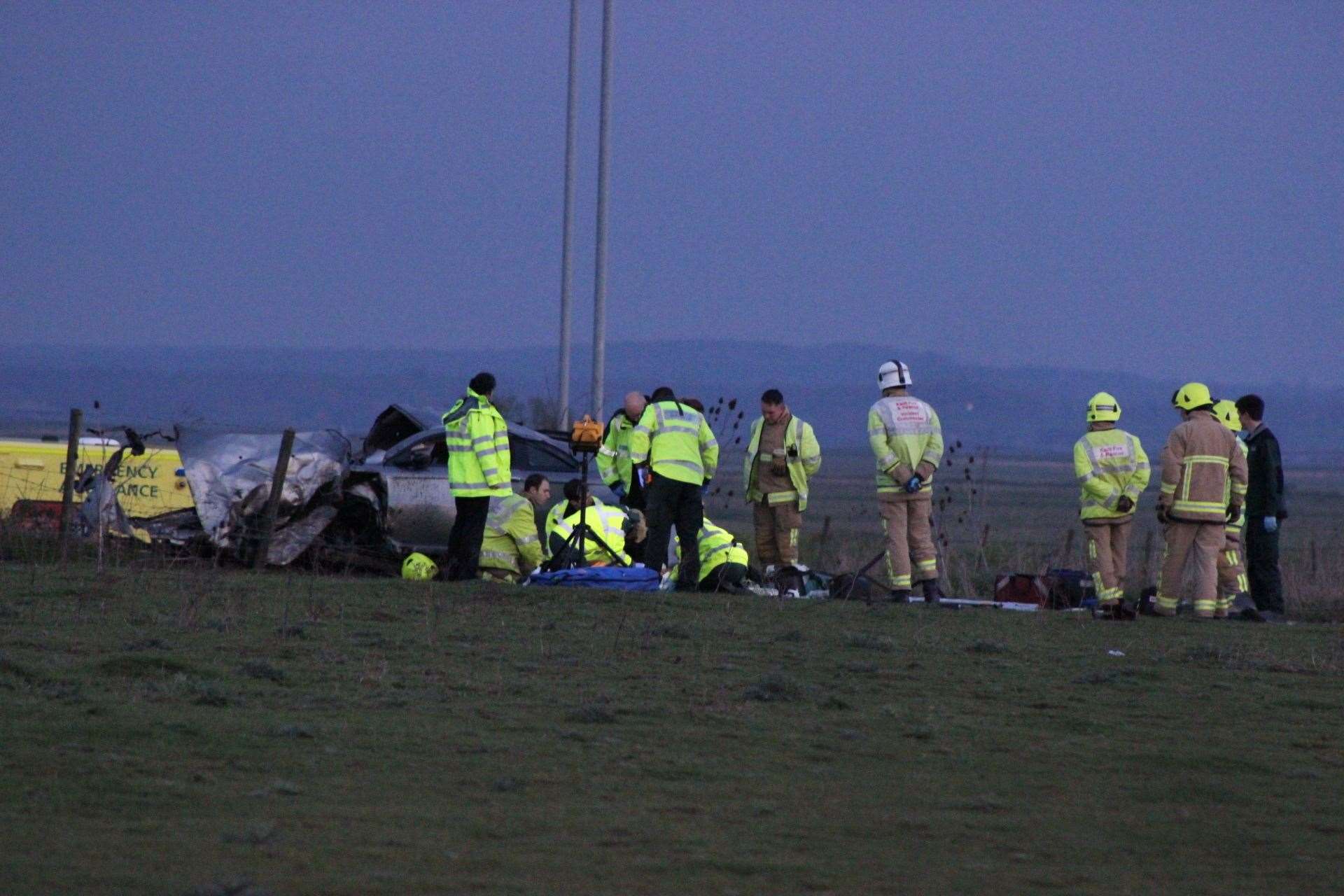 Emergency services at Cowstead Corner, Sheppey, with the wrecked car (8472935)