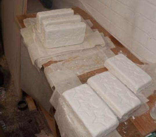 Blocks of drugs found in a garage. Picture: Kent Police