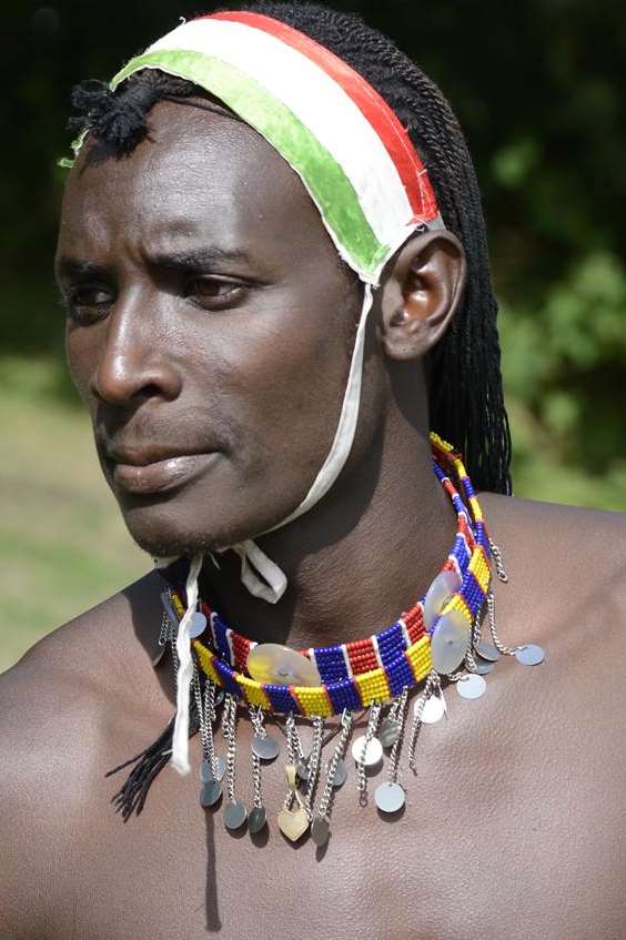 A cricketing Maasai warrior plays at Invicta Park Barracks