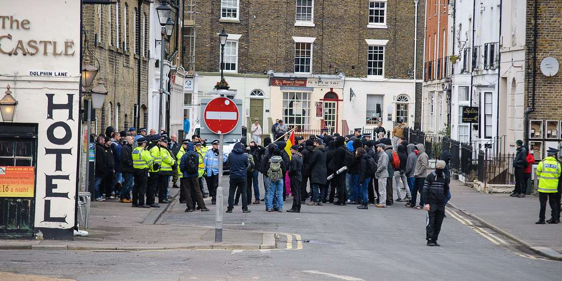 Protesters face police outside the Castle Hotel. Picture: Alan Langley