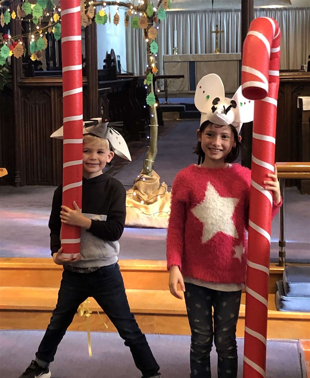 Ronnie Alkin, six and Nahla Sayer, eight, took part in a creative workshop at St Mildred's church during which they made masks for the Christmas parade (21385704)