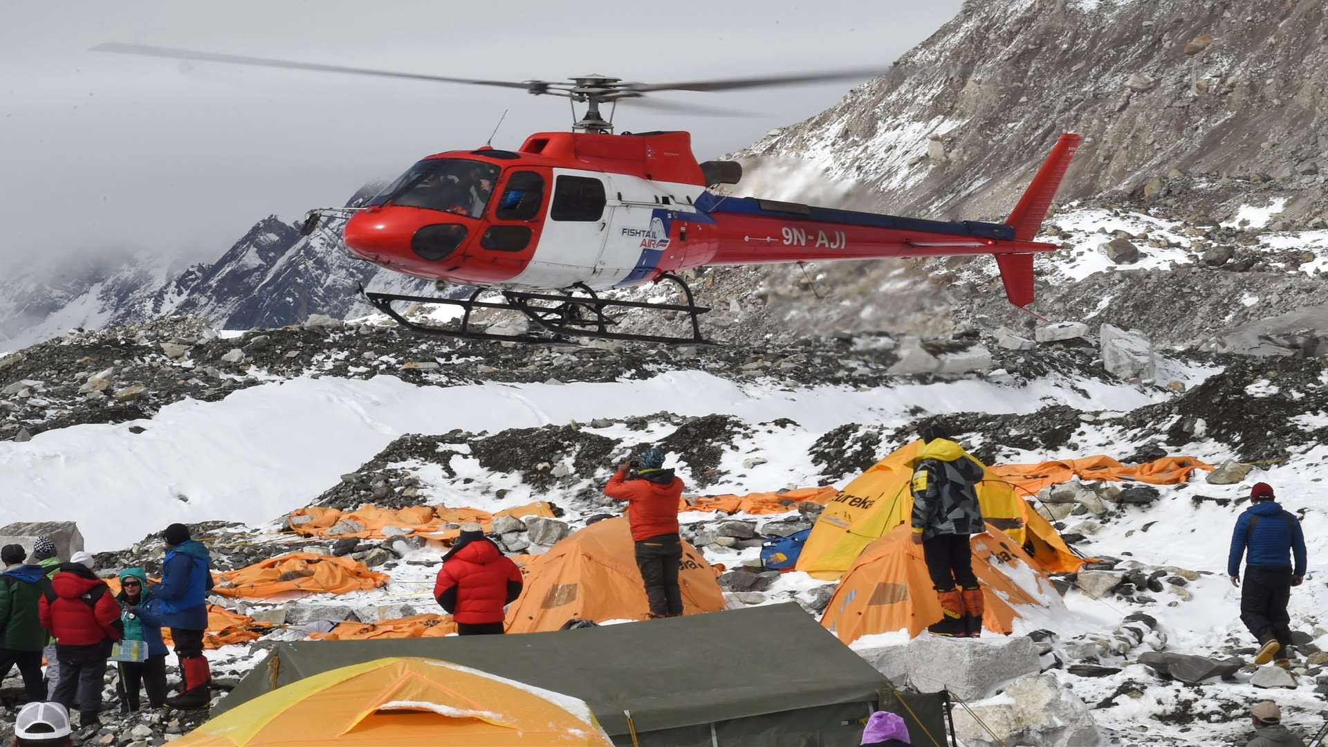 A resecue helicopter at the Everest Base Camp, searching for more casualties of the Nepal earthquake. Picture: Roberto Schmidt/AFP/Getty Images.
