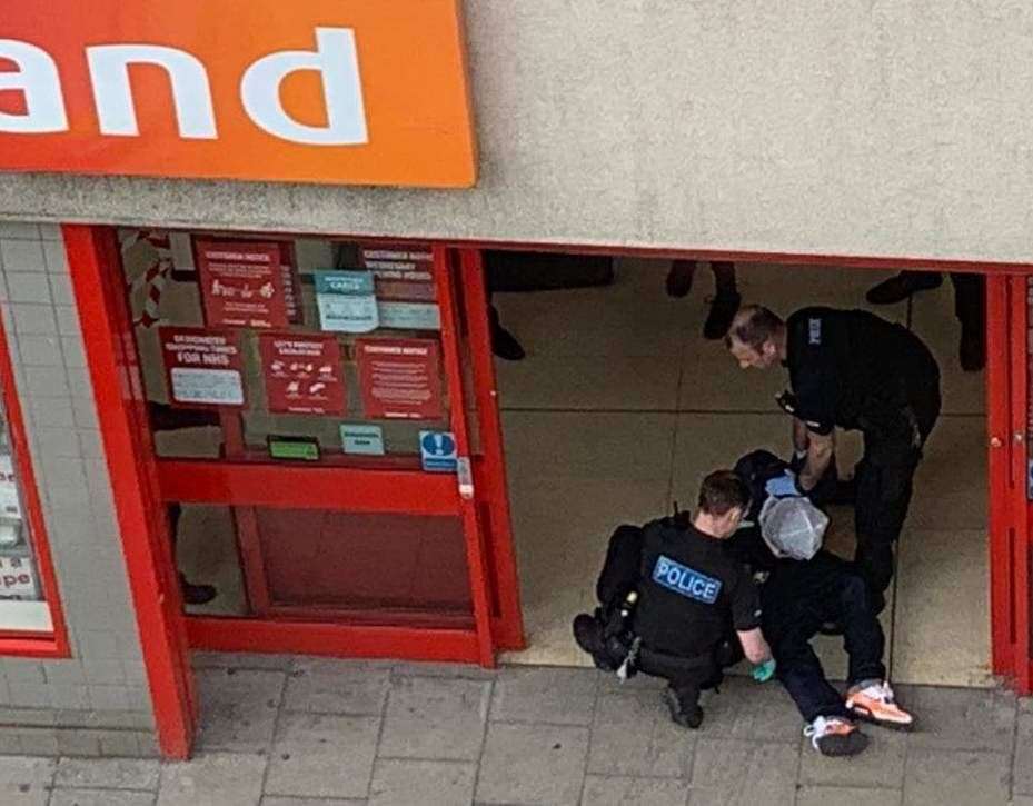 Police arresting the suspect at Iceland in Whitstable (32573420)