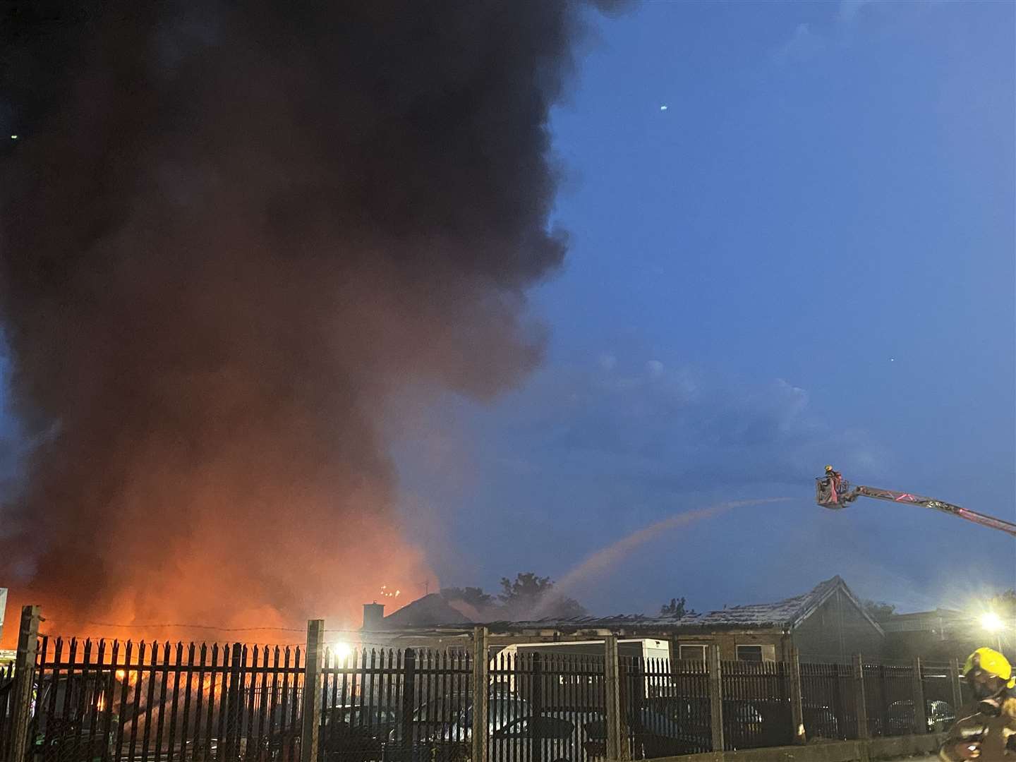 Fire crews remain at the scene in Cobbs Wood Industrial Estate. Picture: KFRS