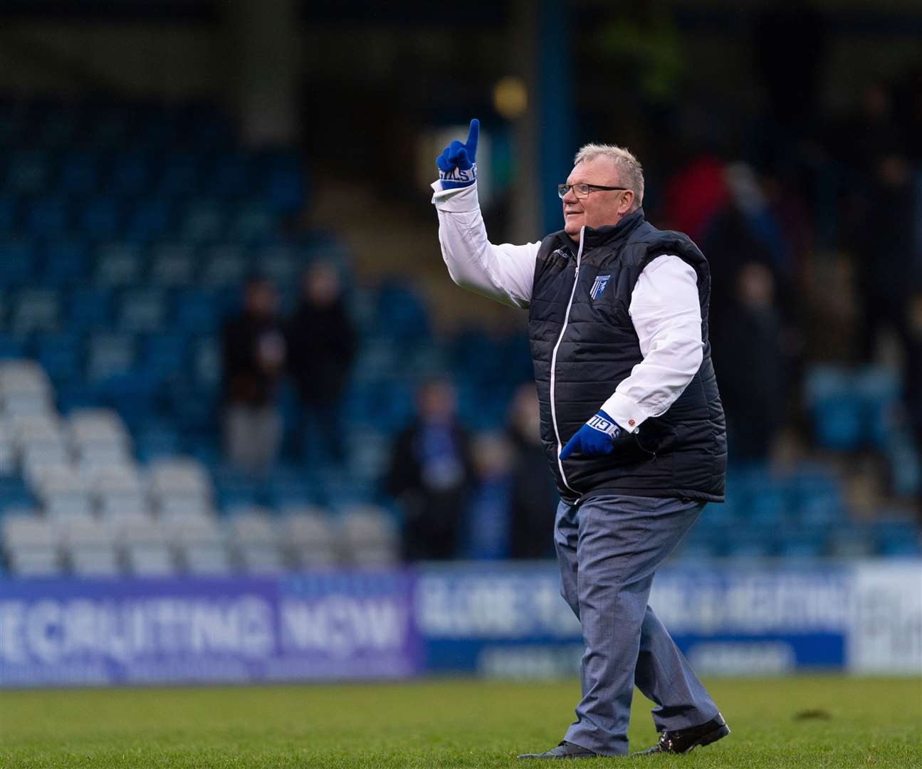Steve Evans has found some lucky gloves and some good form of late, celebrating infront of the Rainham End after a win over MK Dons Picture: Ady Kerry