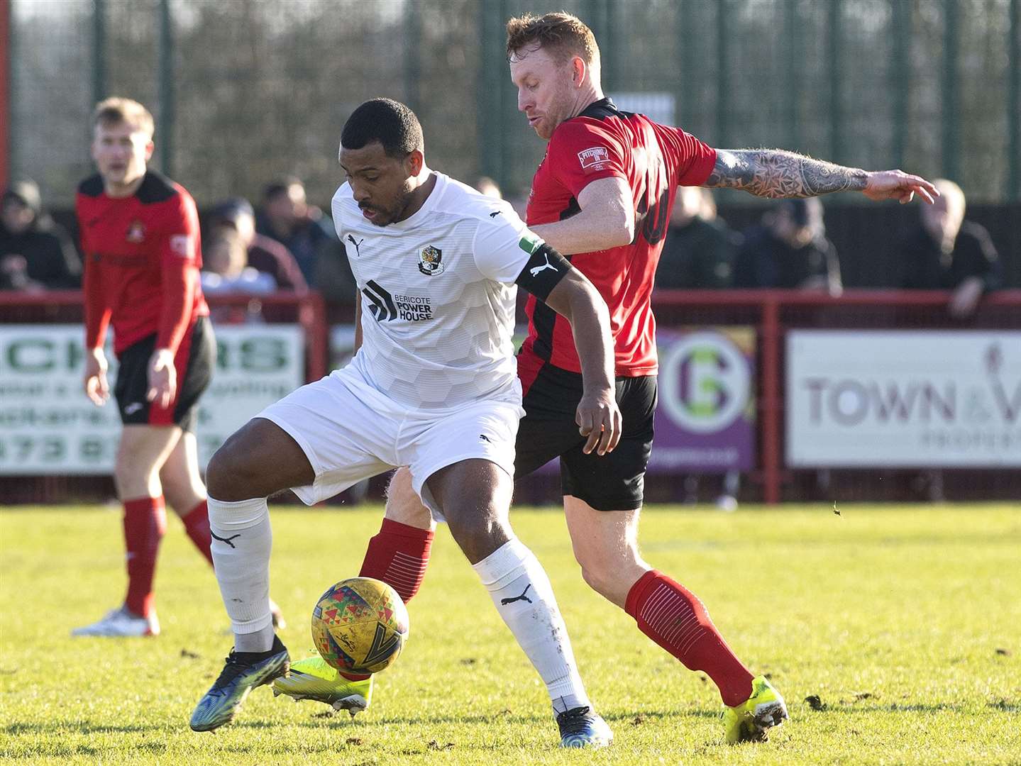 Kieran Murtagh in the thick of the action against Needham Market's Patrick Brothers during Dartford's FA Trophy exit. Picture: Mecha Morton (55061902)