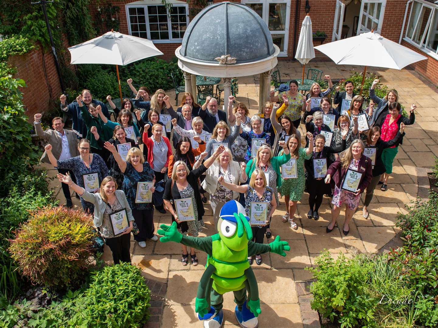 Green Travel Mark award winners with supporters and mascot Buster Bug at Hempstead house in Bapchild, near Sittingbourne. Photo: Encade.