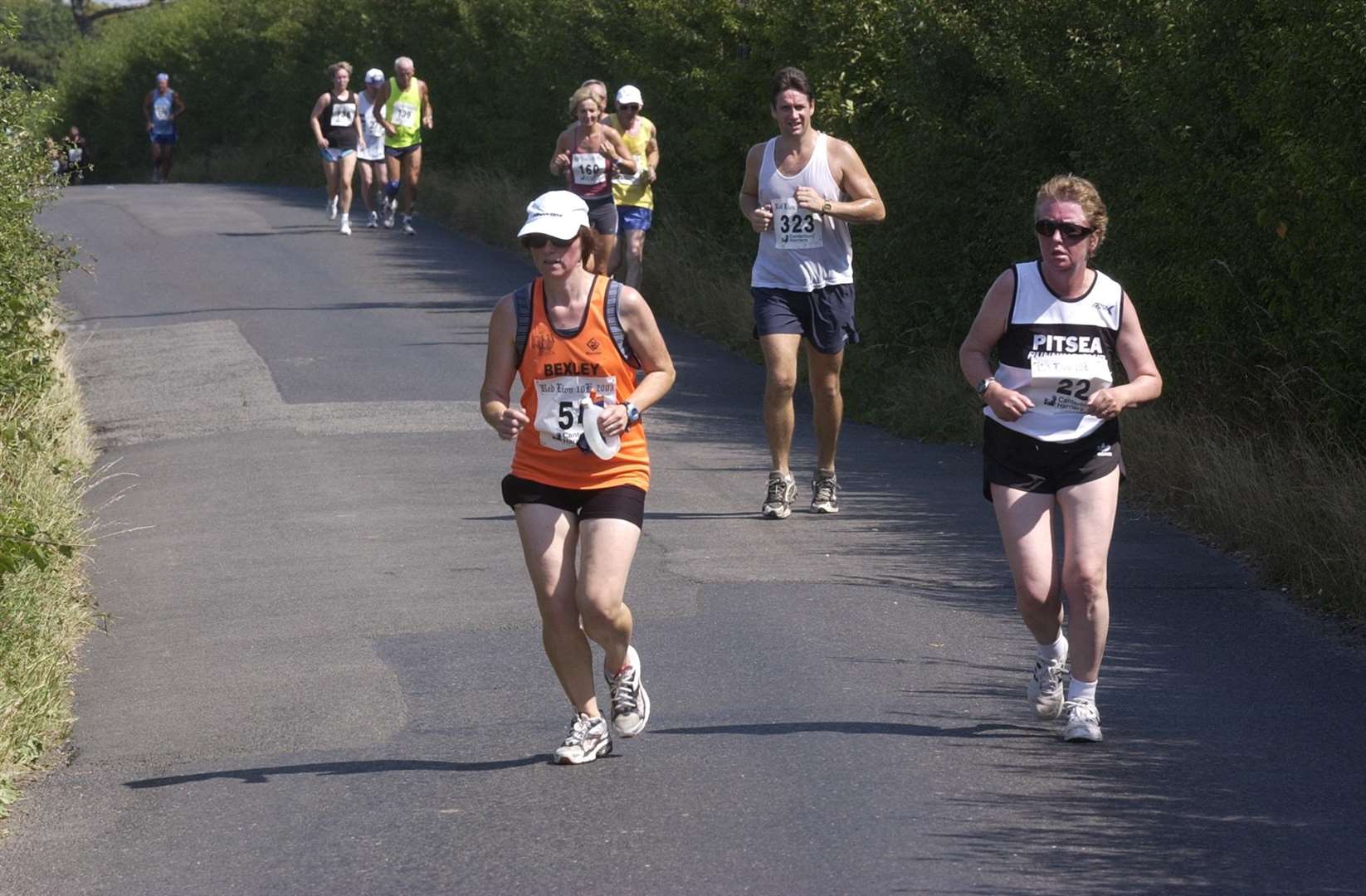 Runners wending their weary way home in the Canterbury Harriers Red Lion 10k on the hottest-day ever recorded in the UK in 2003