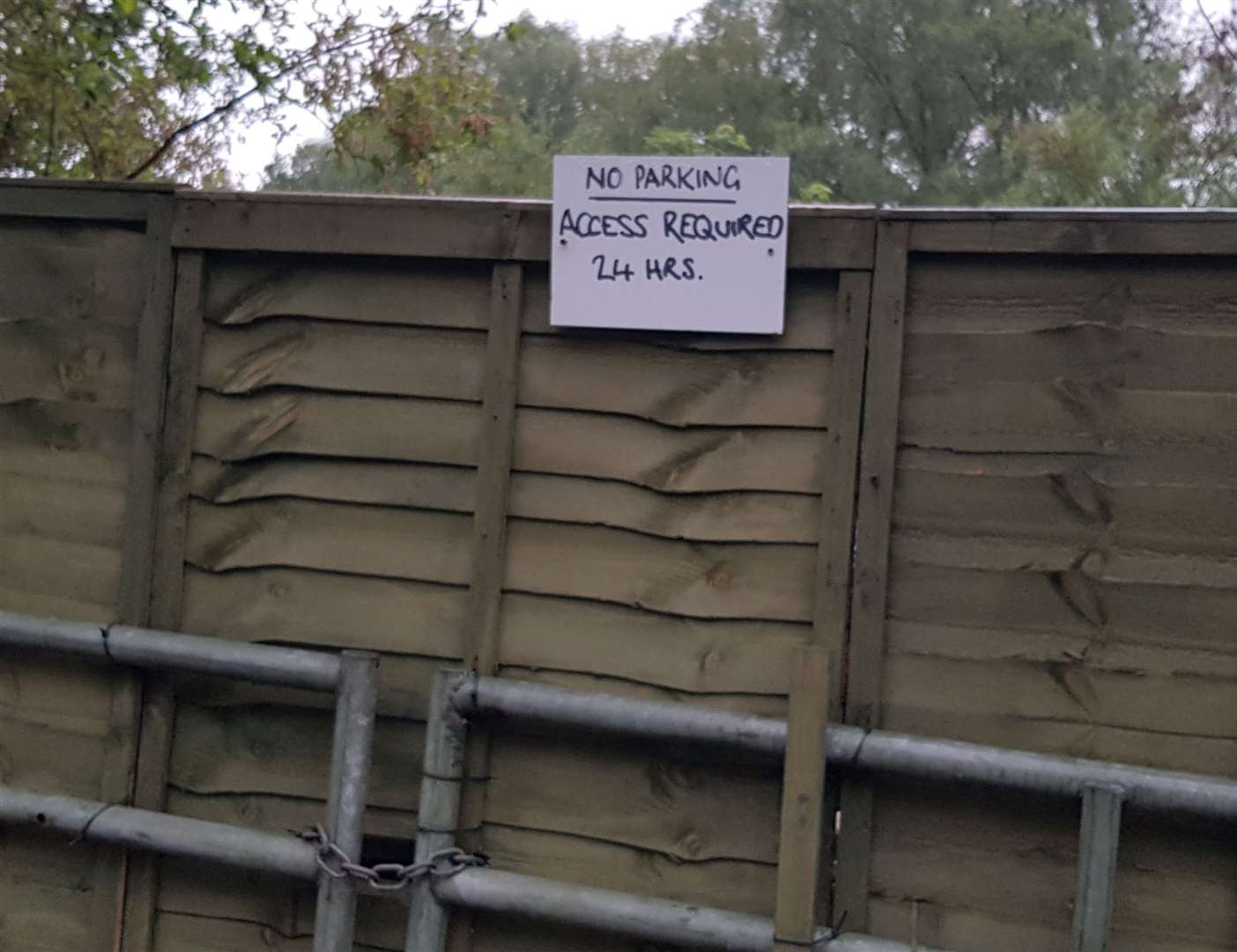 Travellers are living at a site in Leybourne, just off the M20, and have created a homemade sign, saying they need access to the land 24/7