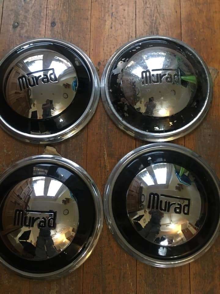 Set of four Murad hubcaps still owned by Stephen Partridge (46173730)