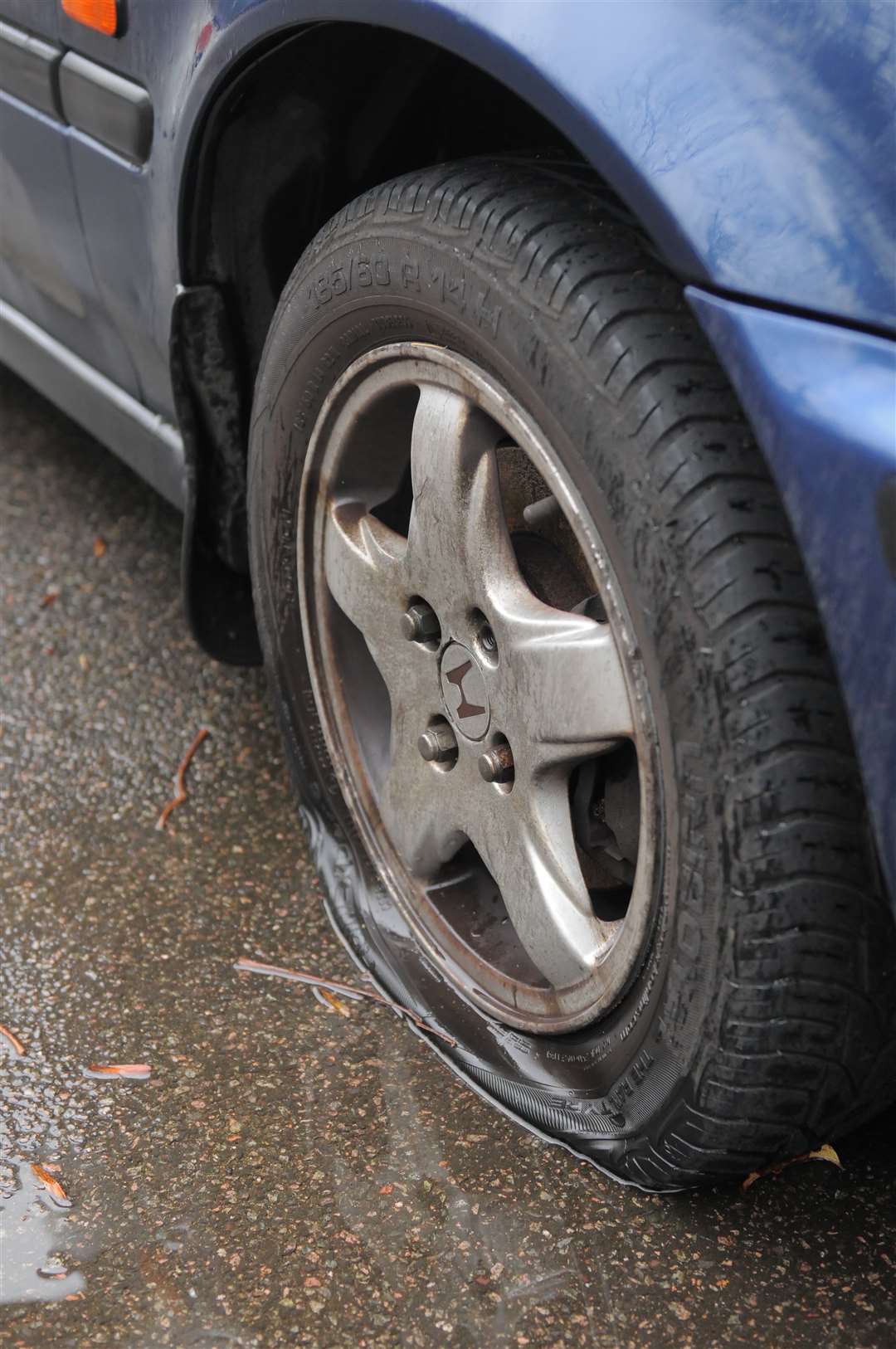 Stock pic: slashed tyre