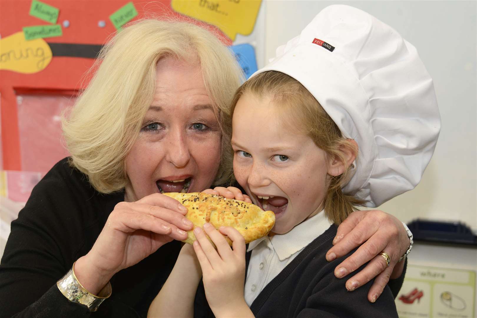 Jill Martin, pictured with Tegan Birtwell, when she visited Sandown Primary School to teach them about home based cooking Picture: Paul Amos